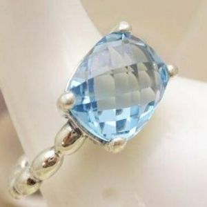 Silver Pandora ring with blue stone